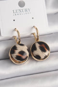 Mey İthalat® Pirinç Gold Renk Leopar Desenli Daire Model Kadın Küpe