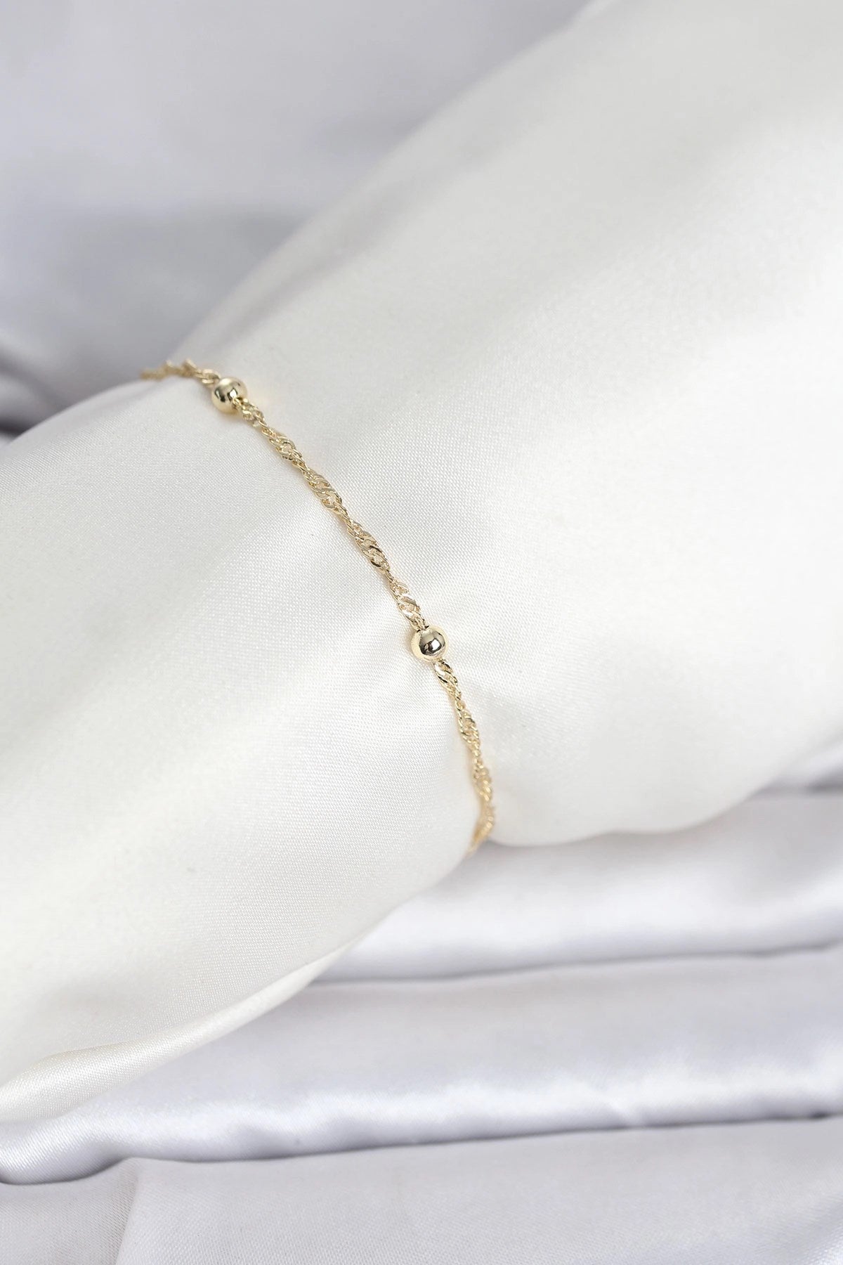 Mey İthalat® CM 14K Gold Renk Burgu Topçuk Model Kadın Bileklik